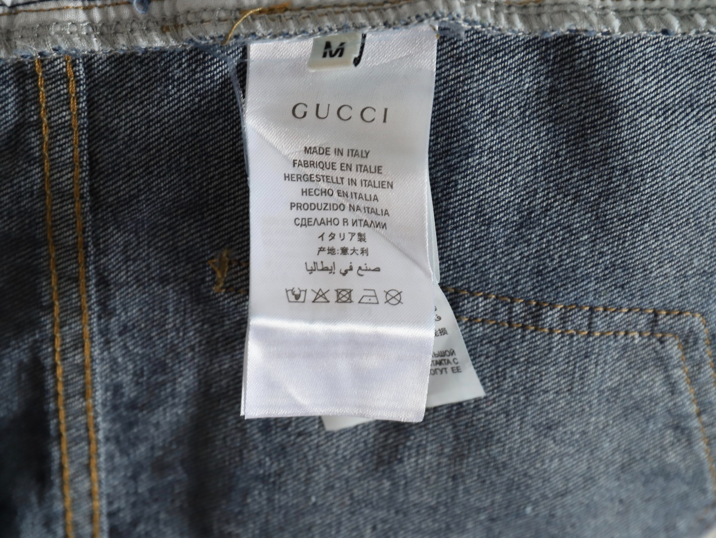 G*u*i shorts