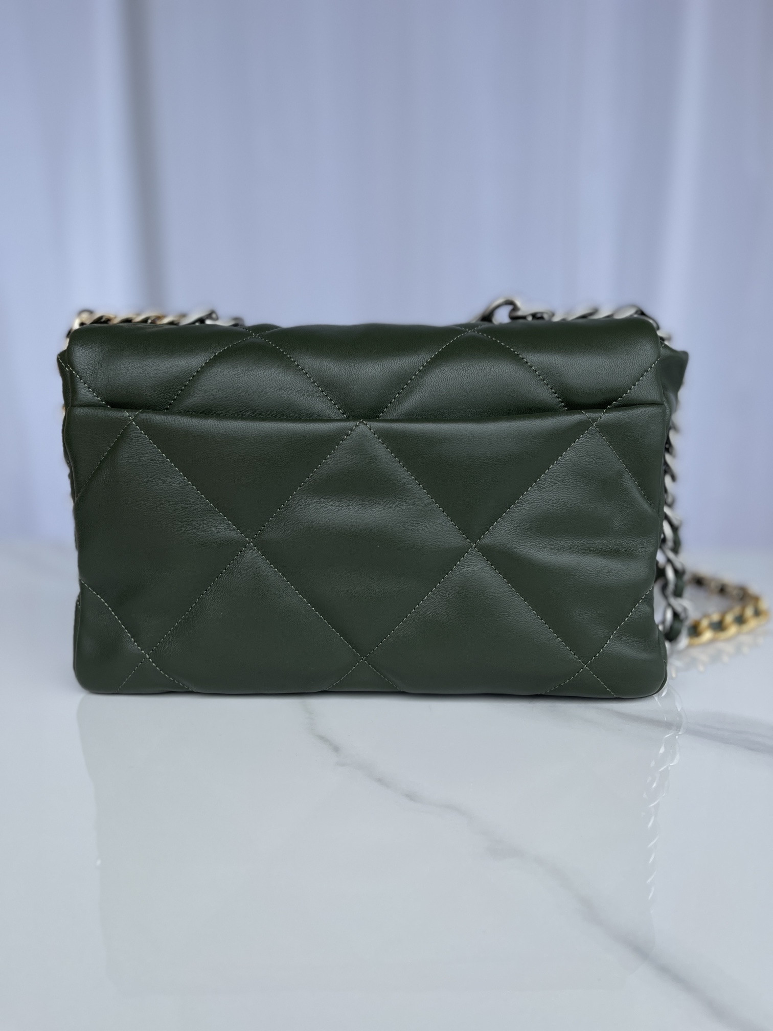 Ch*el 19 large handbag shiny leather, gold-tone, silver-tone & ruthenium-finish metal dark green 7.8 × 11.7 × 3.9 in