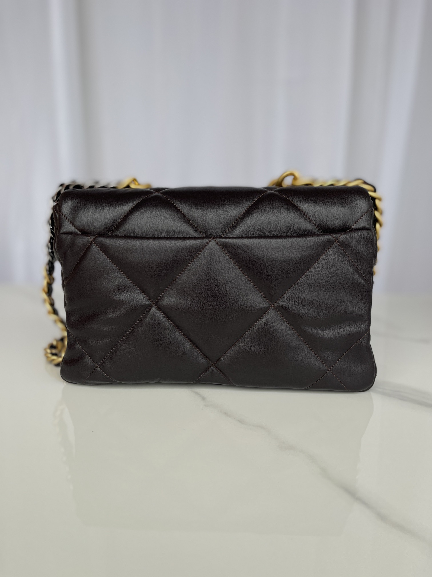 Ch*el 19 large handbag shiny leather, gold-tone, silver-tone & ruthenium-finish metal black 7.8 × 11.7 × 3.9 in