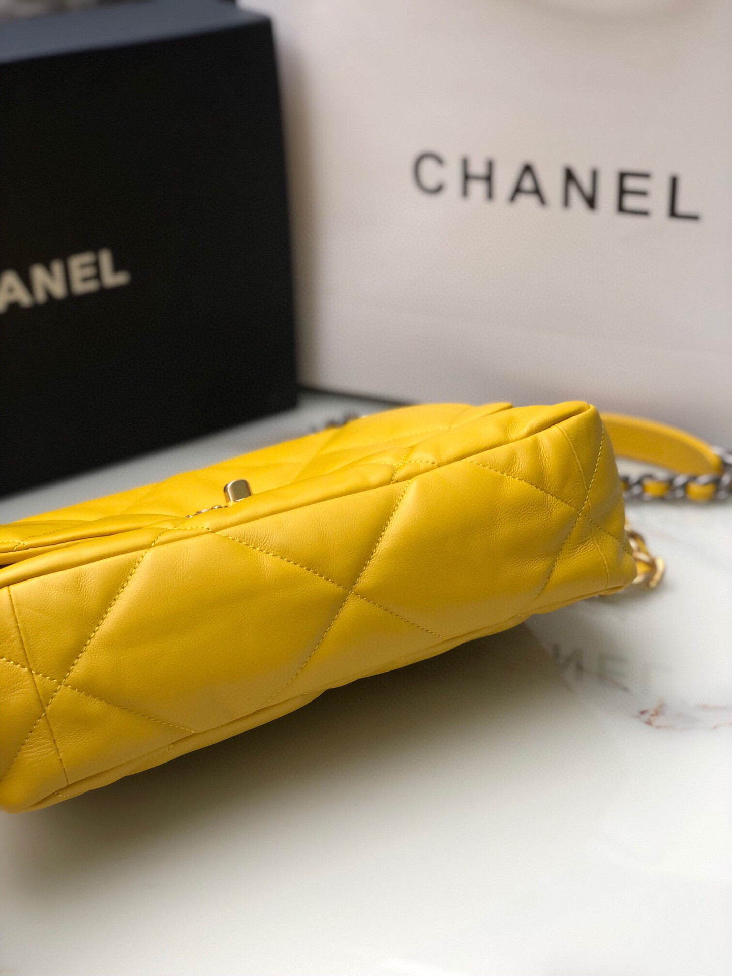 Ch*el 19 large handbag shiny leather, gold-tone, silver-tone & ruthenium-finish metal yellow 7.8 × 11.7 × 3.9 in