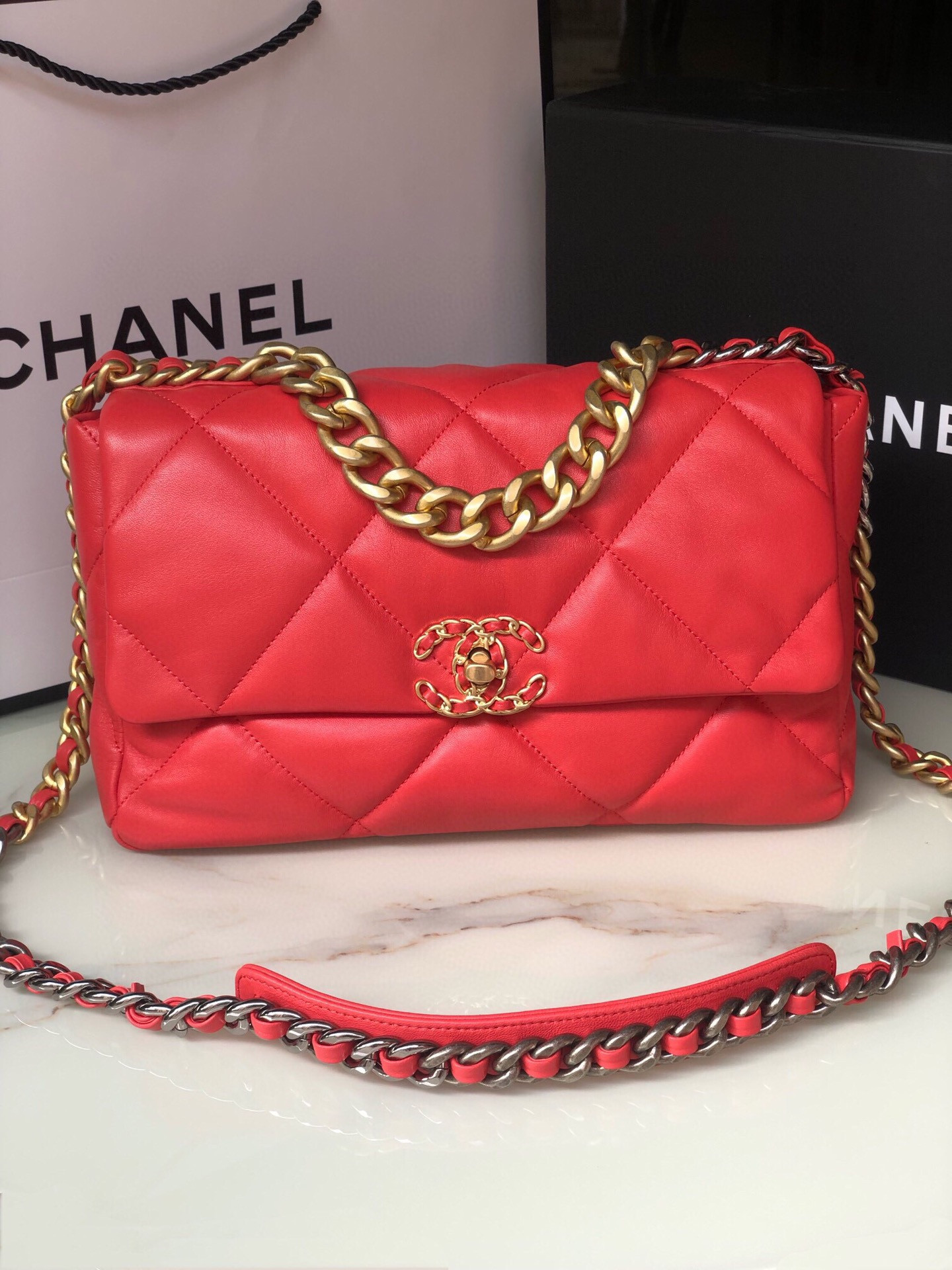Ch*el 19 large handbag shiny leather red, gold-tone, silver-tone & ruthenium-finish metal 7.8 × 11.7 × 3.9 in