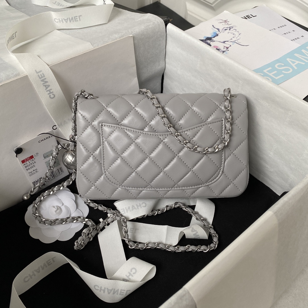 Ch*el mini flap bag shiny calfskin & silver-tone metal light gray 4.7 × 7.8 × 2.3 in