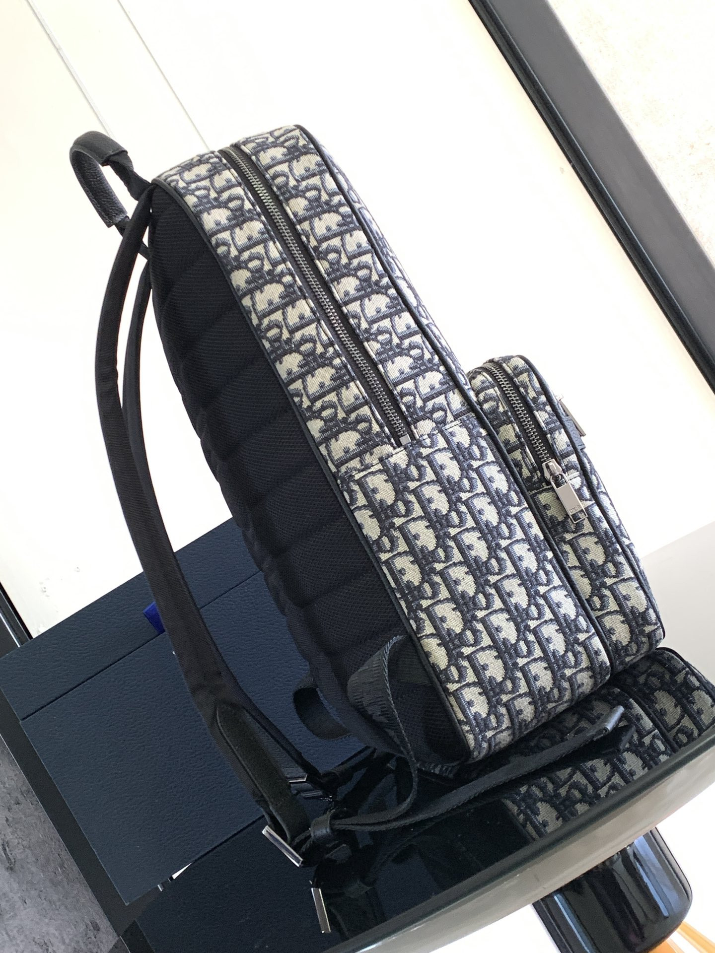 D*or safari backpack  beige and black D*or oblique jacquard 11 x 16 x 5.5 inches