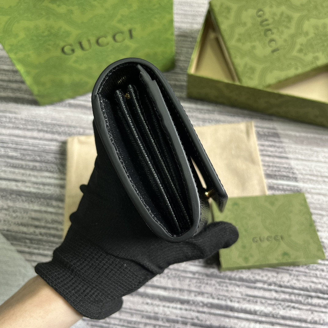 continental wallet with G*u*i script  7.5"w x 4"h x 1.4"d