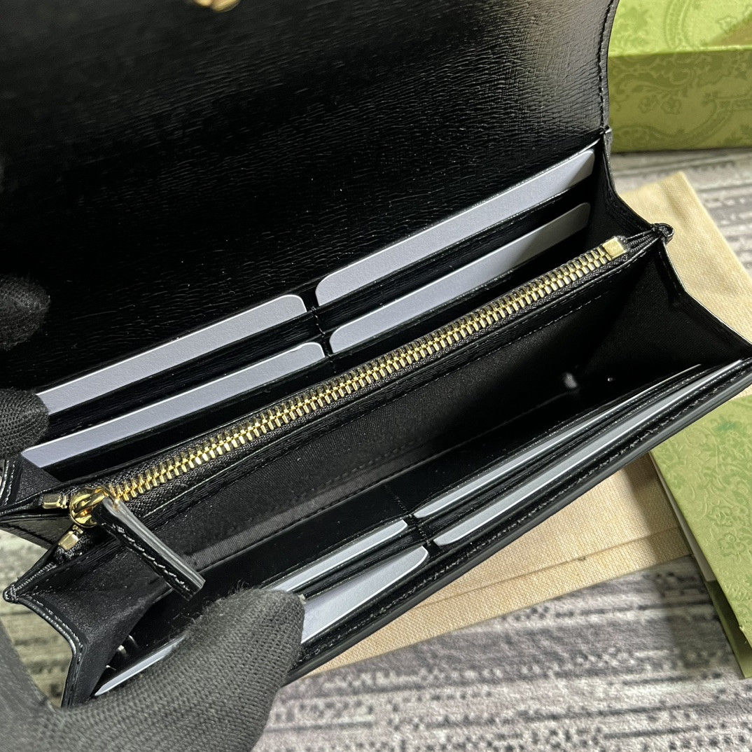 continental wallet with G*u*i script  7.5"w x 4"h x 1.4"d