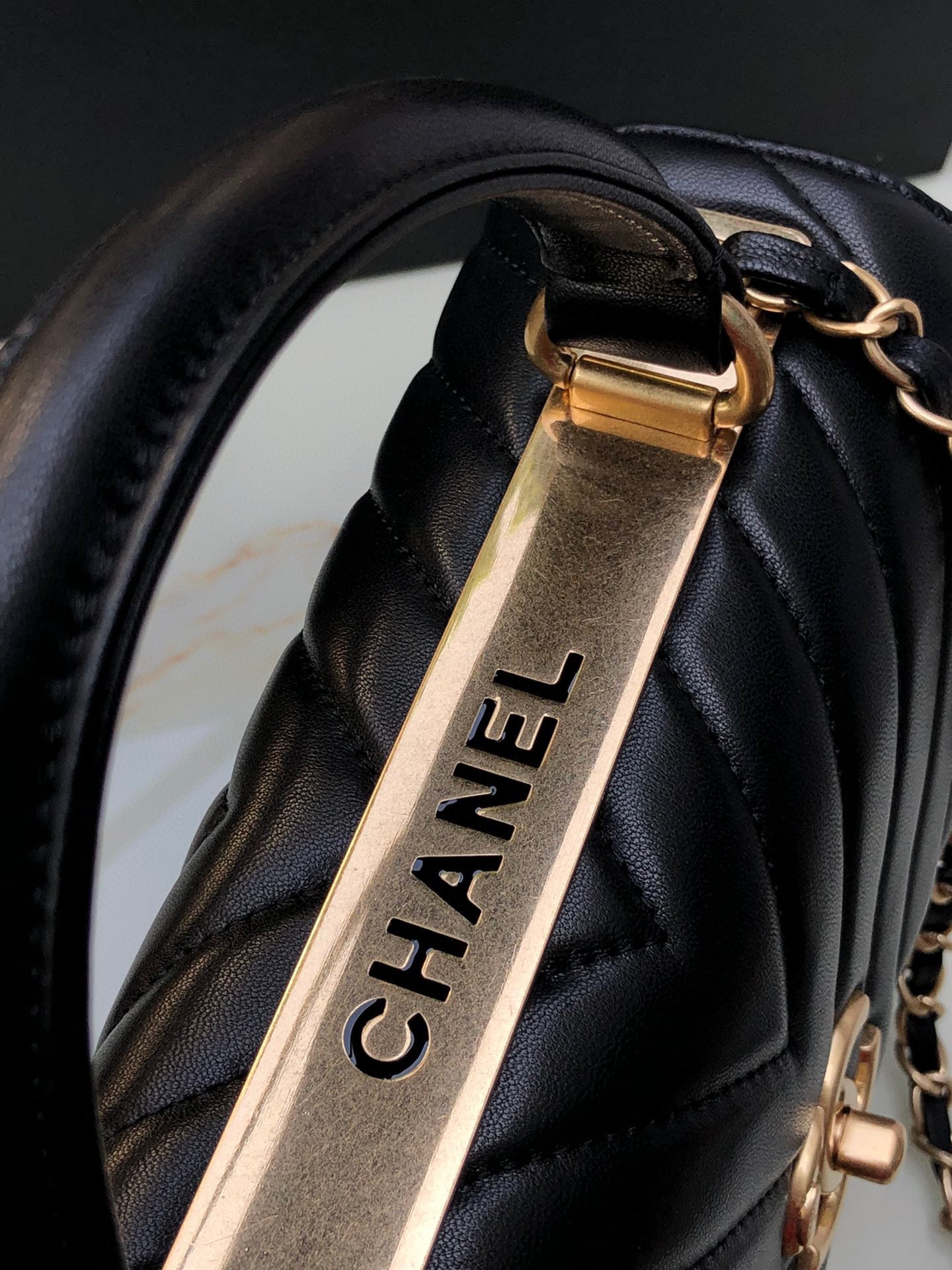 Ch*el flap bag with top handle 6.6 × 9.8 × 4.7 in