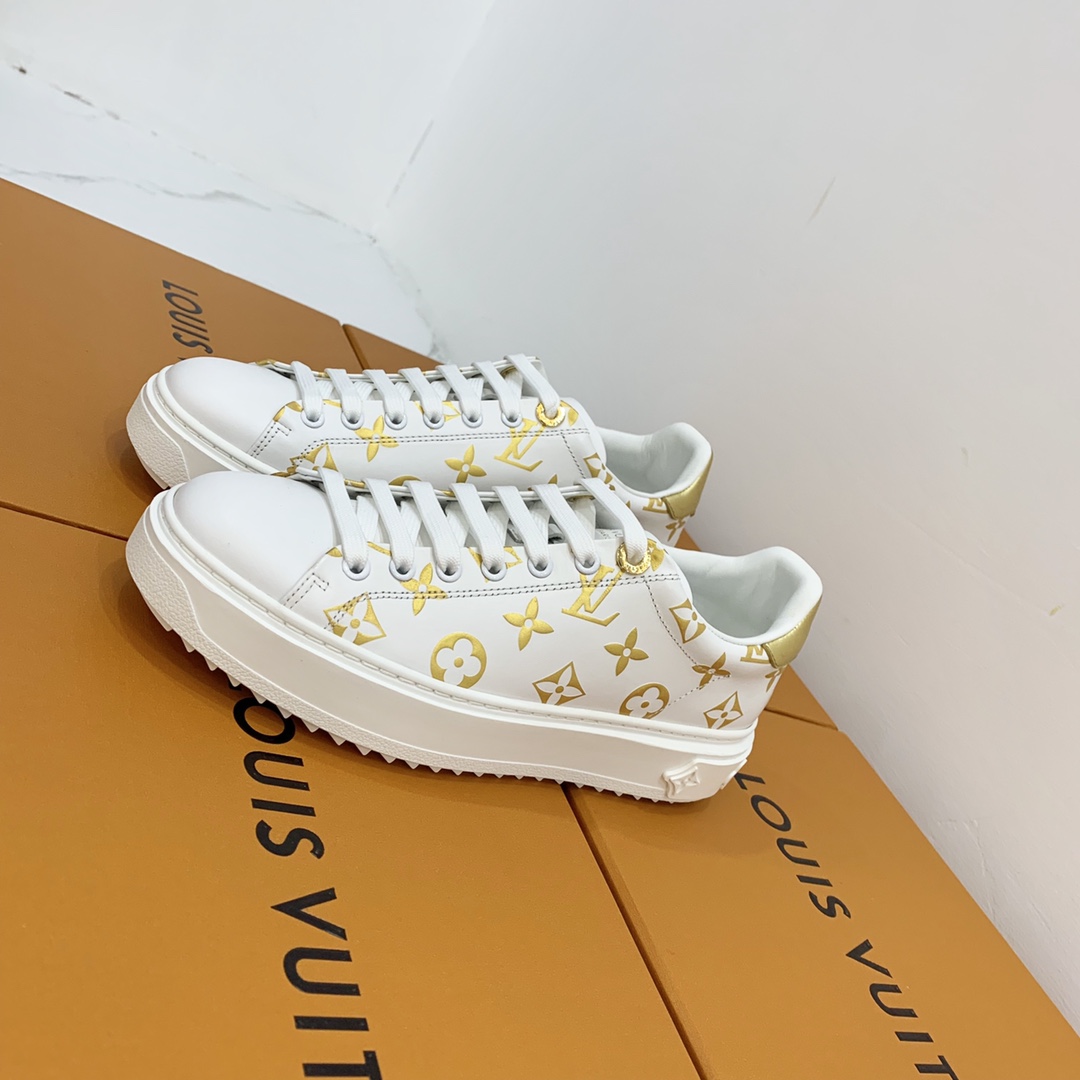 l0*is V*t0n low-top sneakers