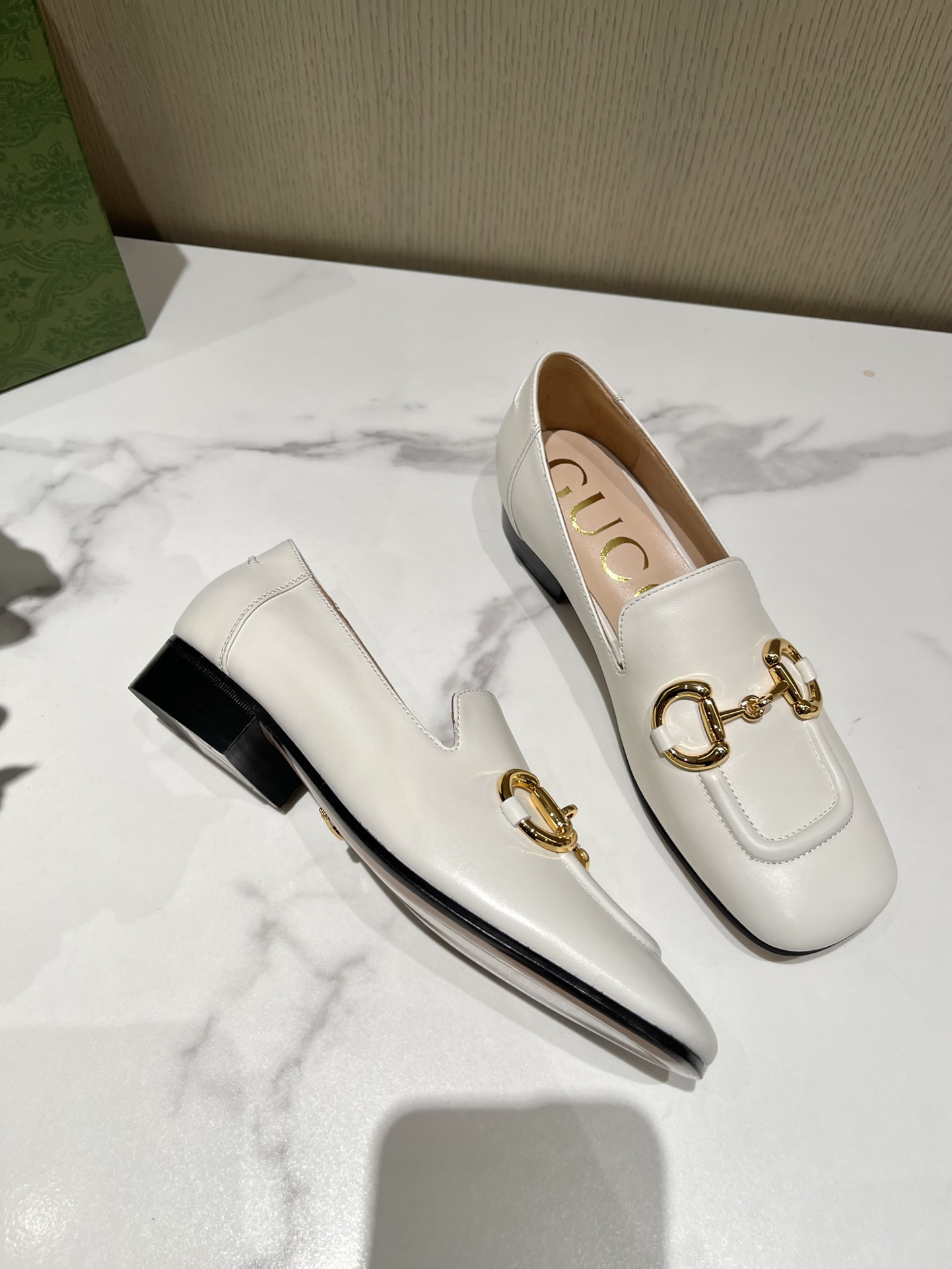 G*u*i loafers