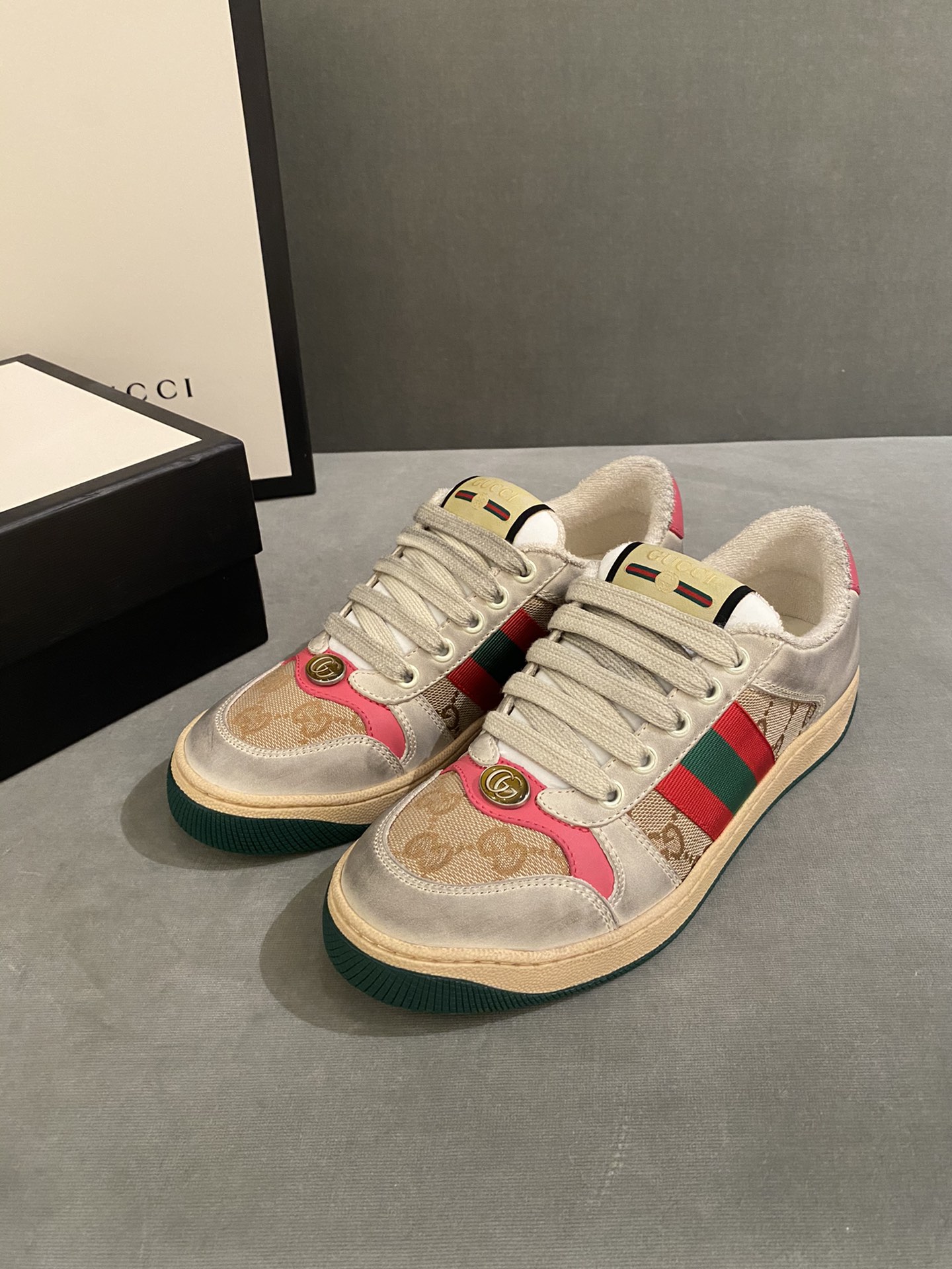 G*u*i sneakers