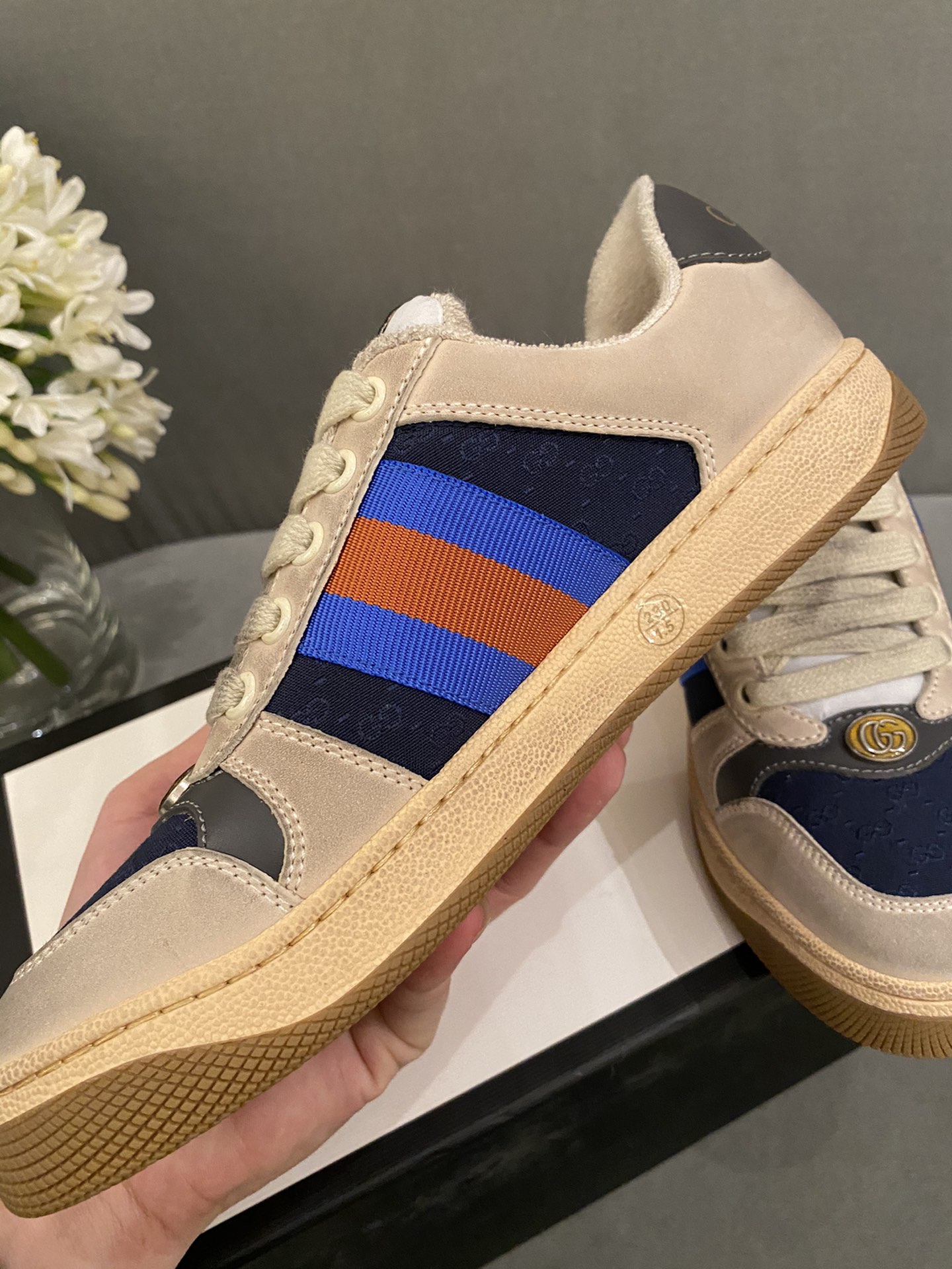 G*u*i sneakers