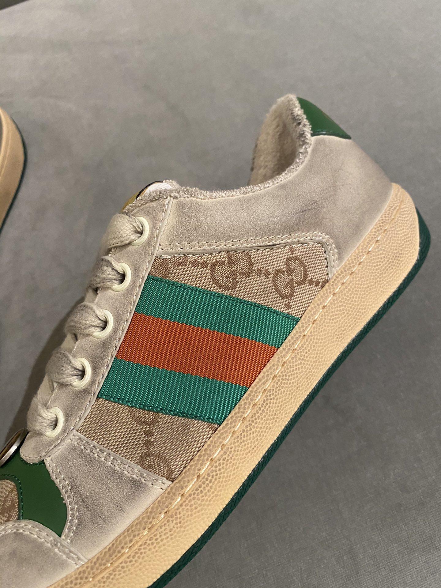 G*u*i sneakers