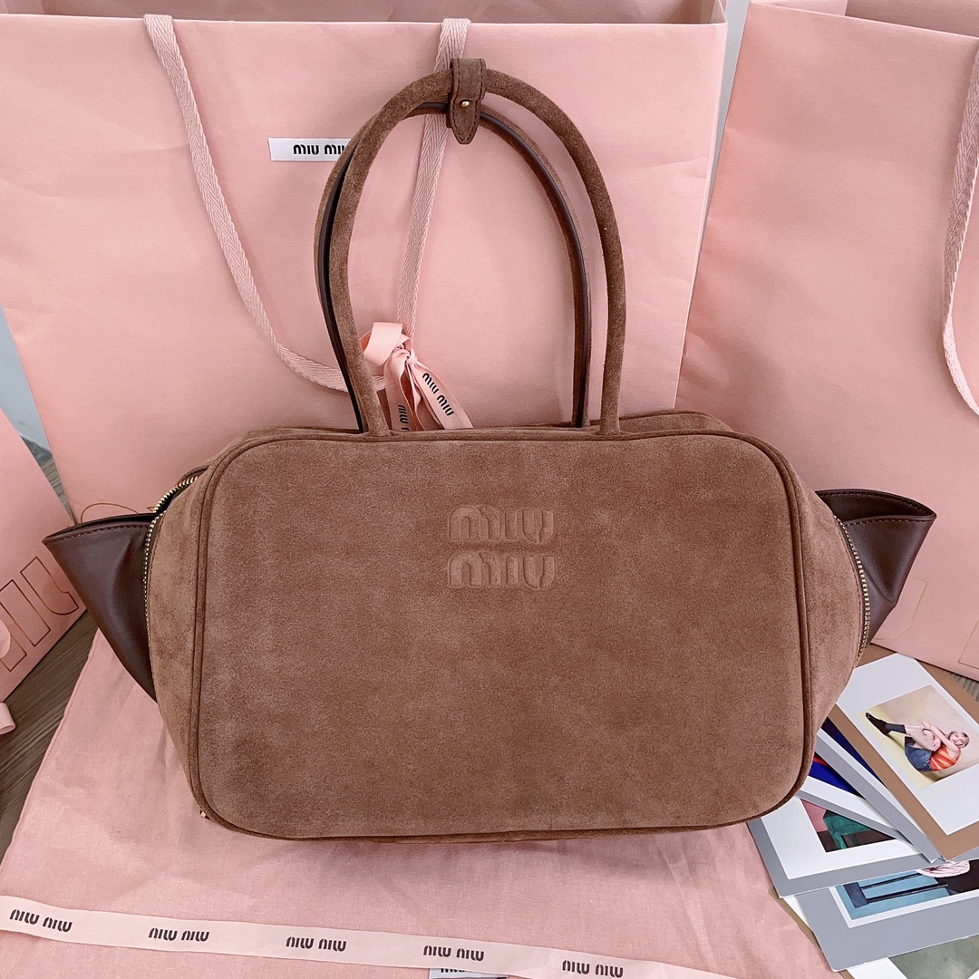 M*um*u leather top handbag-34x23x12cm