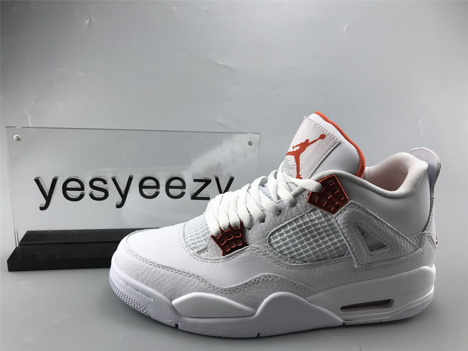 UA AIR JORDAN 4 RETRO METALLIC ORANGE