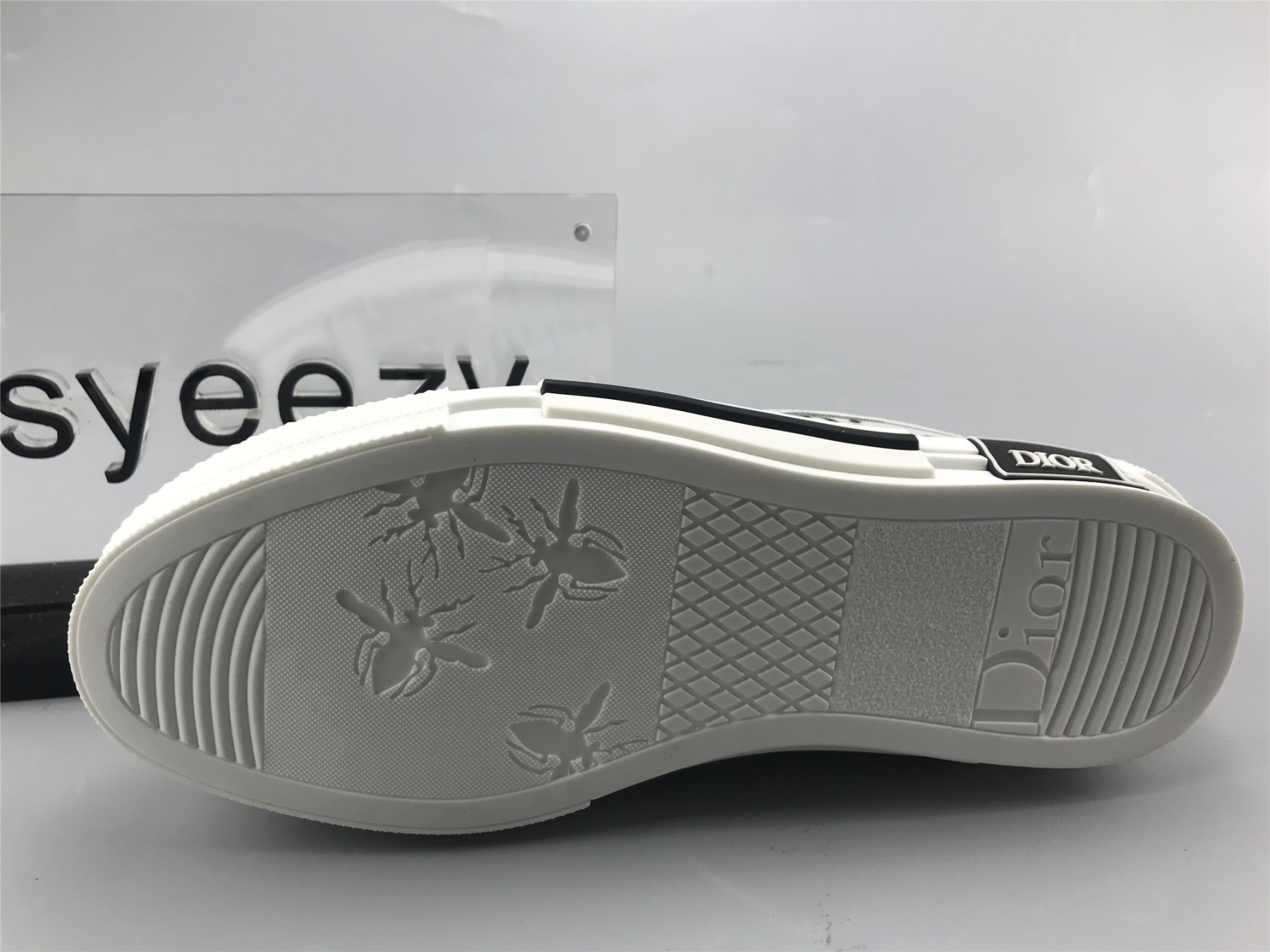 ua D10r b23 low top daniel asham newspaper