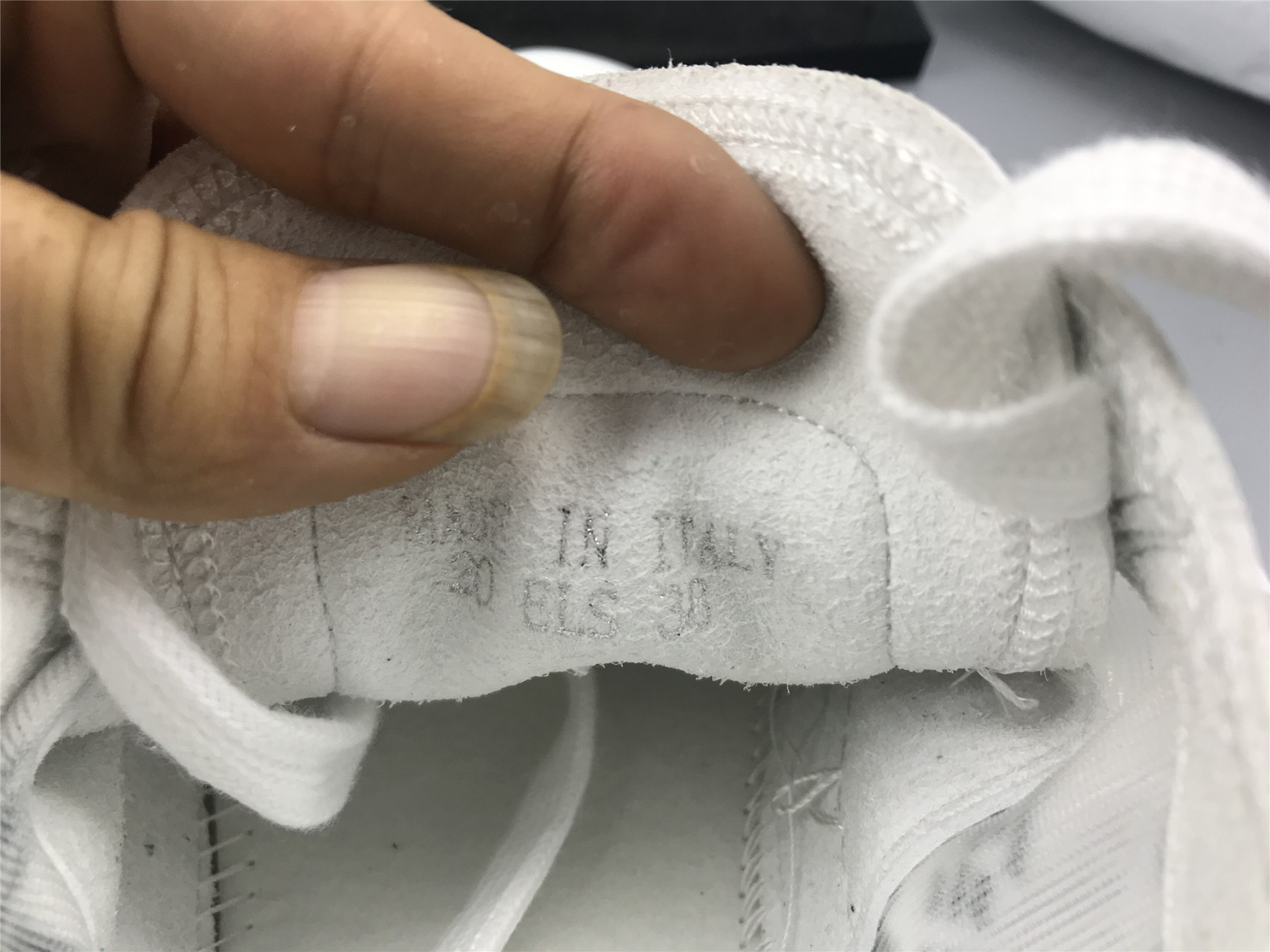 ua D10r b23 low top daniel asham newspaper