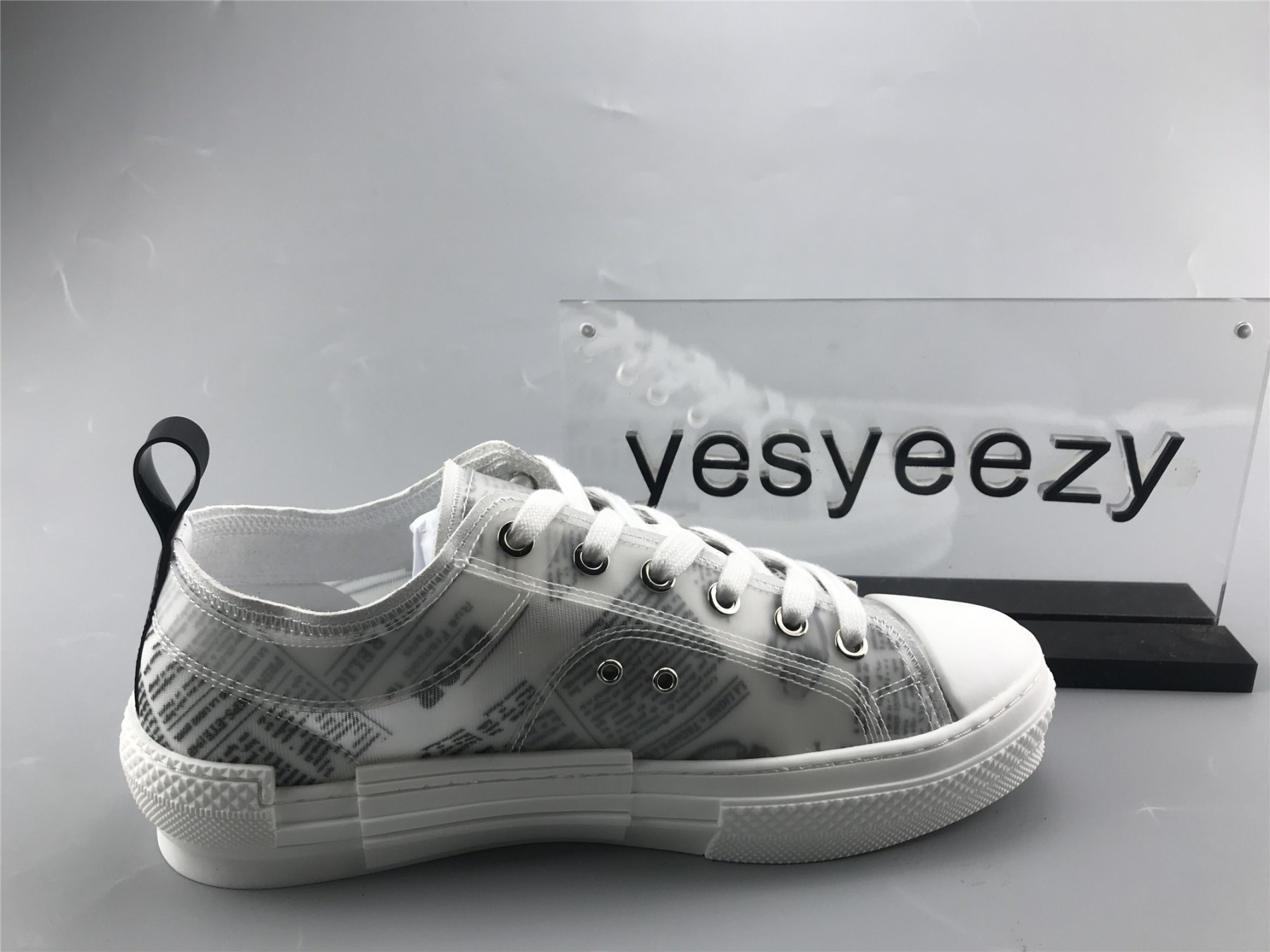 ua D10r b23 low top daniel asham newspaper