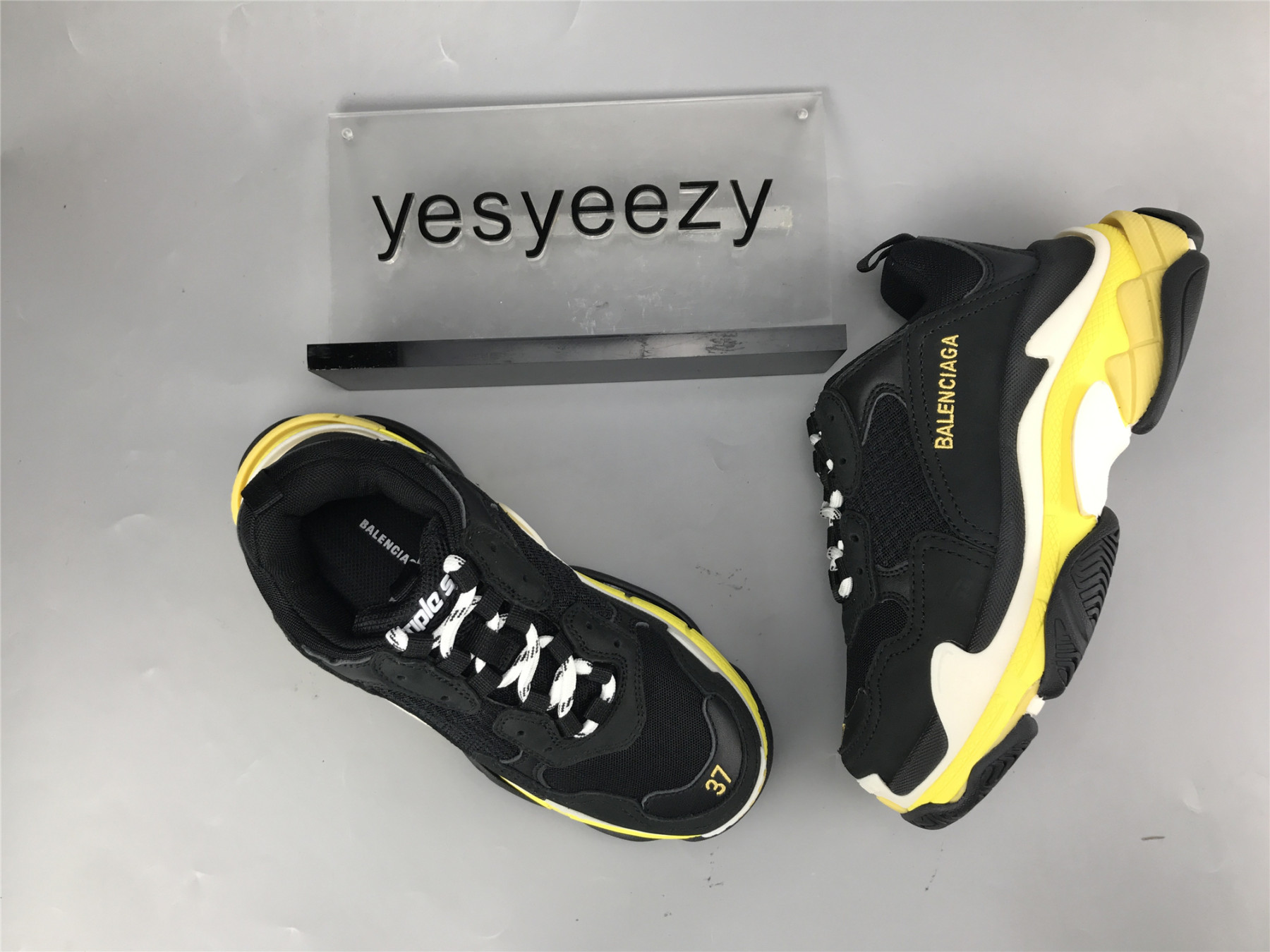 UA TRIPLE S CLEAR SOLE BLACK YELLOW