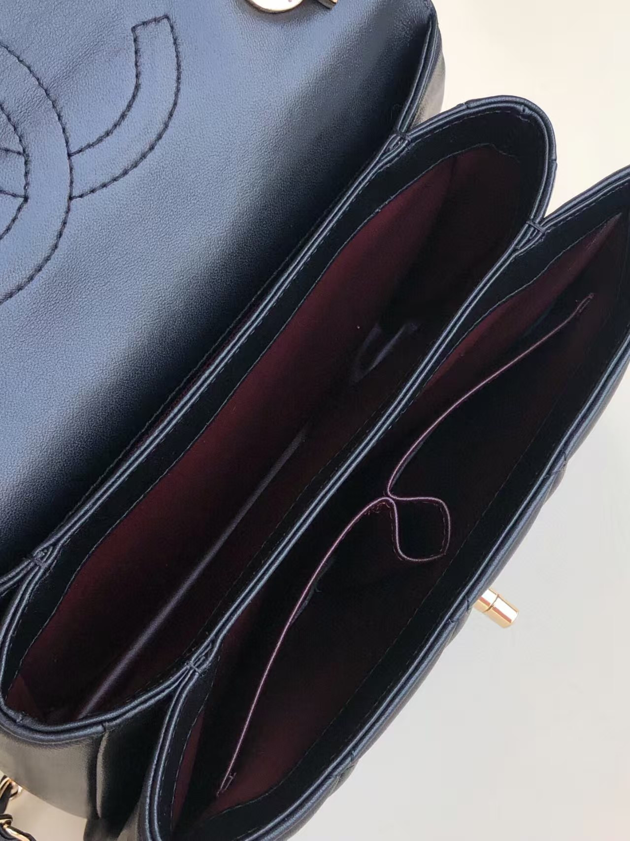 Ch**el flap bag with top handle 6.6 × 9.8 × 4.7 in