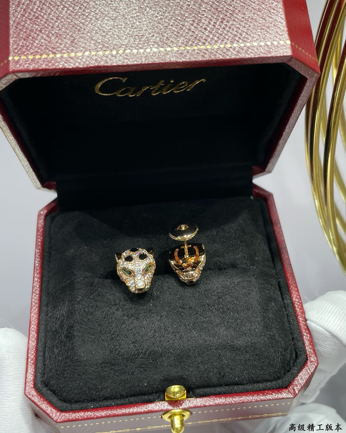 Ca*t1er earrings