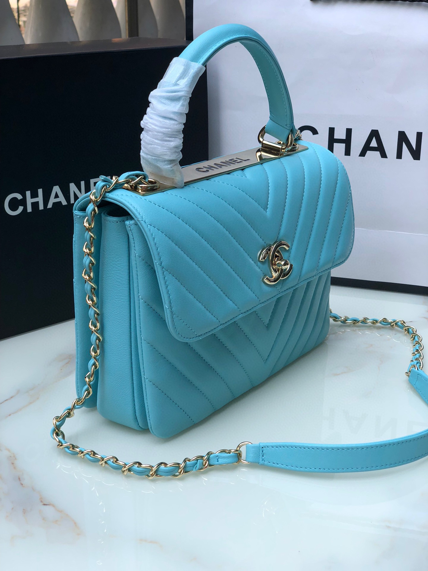 Ch**el FLAP BAG WITH TOP HANDLE 6.6 × 9.8 × 4.7 in