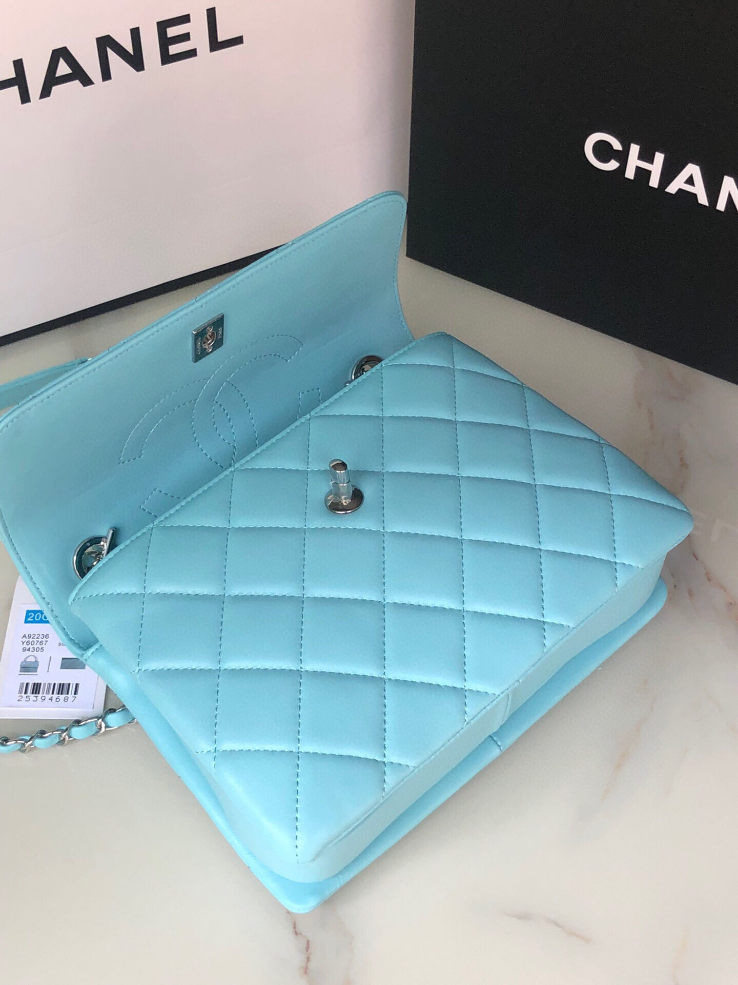 Ch**el FLAP BAG WITH TOP HANDLE 6.6 × 9.8 × 4.7 in