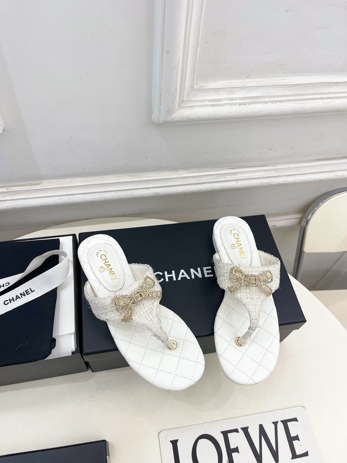 ua Ch**el thongs sandals